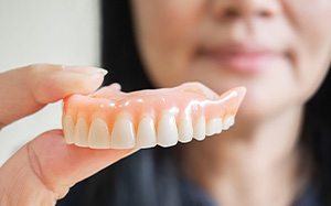 If you’re missing multiple teeth and are in good oral health, you may be a good candidate for dentures