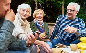Group of friends enjoying breakfast outdoors